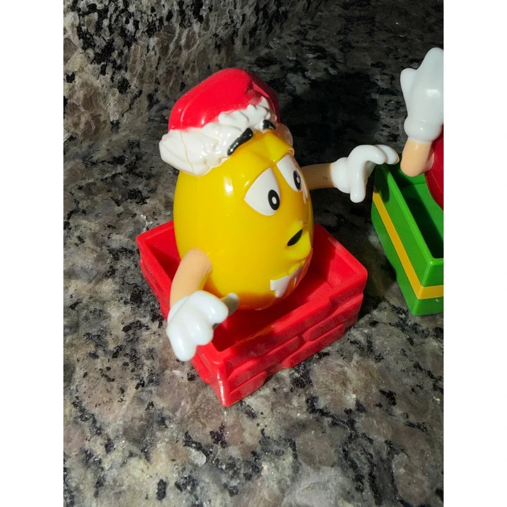 M&M's Christmas Holiday Figurines Red and Yellow Santa Hat Gift Box Set of 4